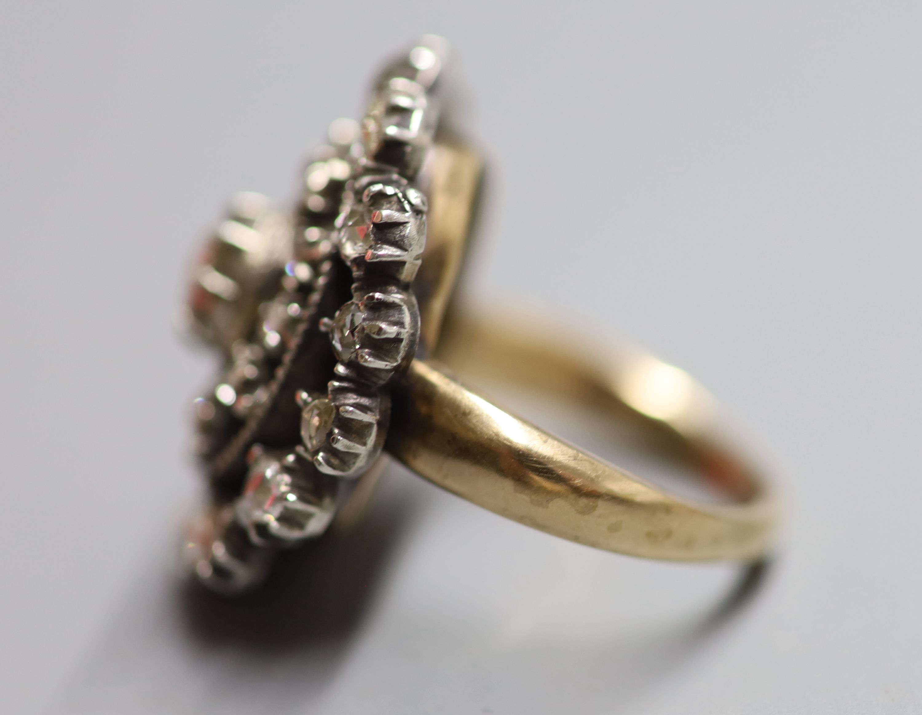 An antique yellow and white metal, rose cut diamond set dress ring, size P/Q, gross 15.6 grams.